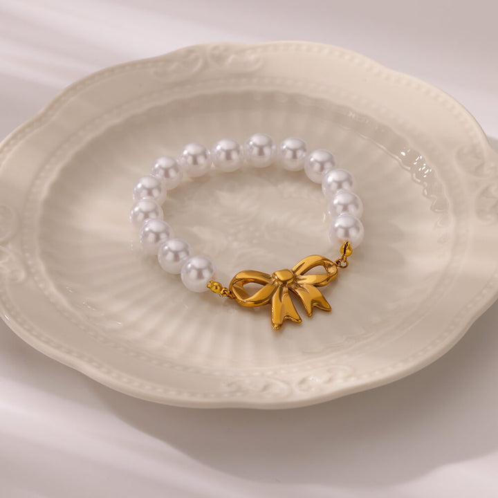 Gold Bowknot Bracelet with Imitation Pearls