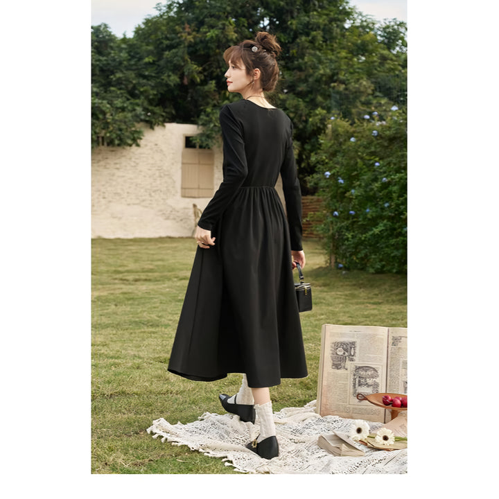 Elegant Black Knitted Smocked V-neck A-line Midi Dress