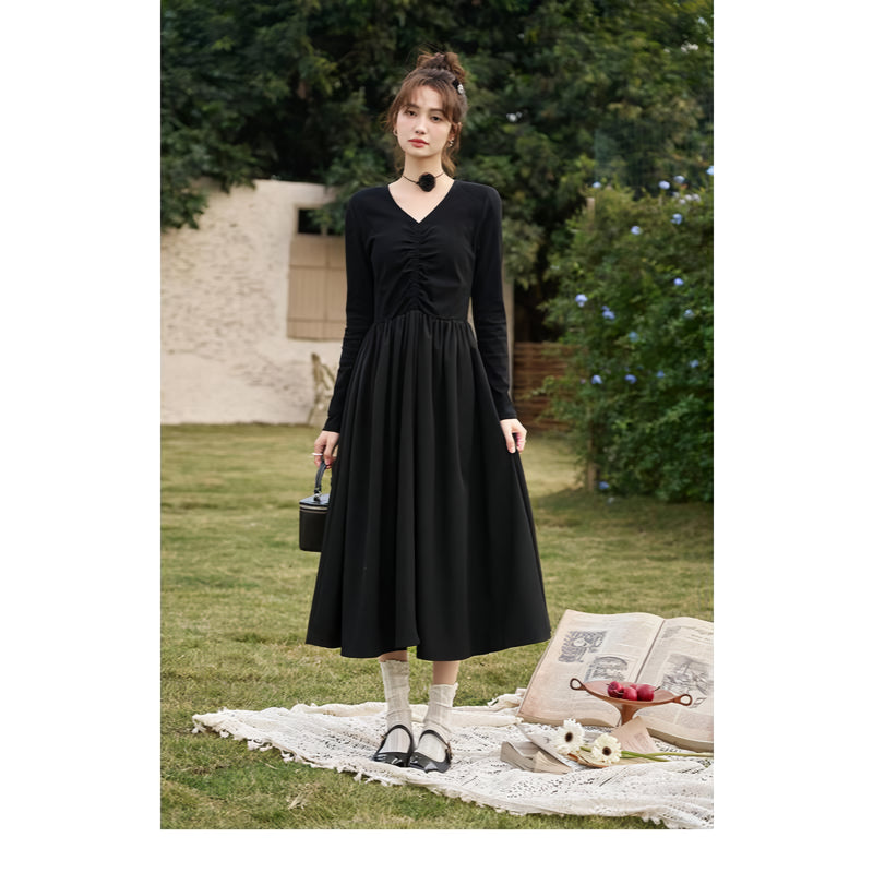 Elegant Black Knitted Smocked V-neck A-line Midi Dress