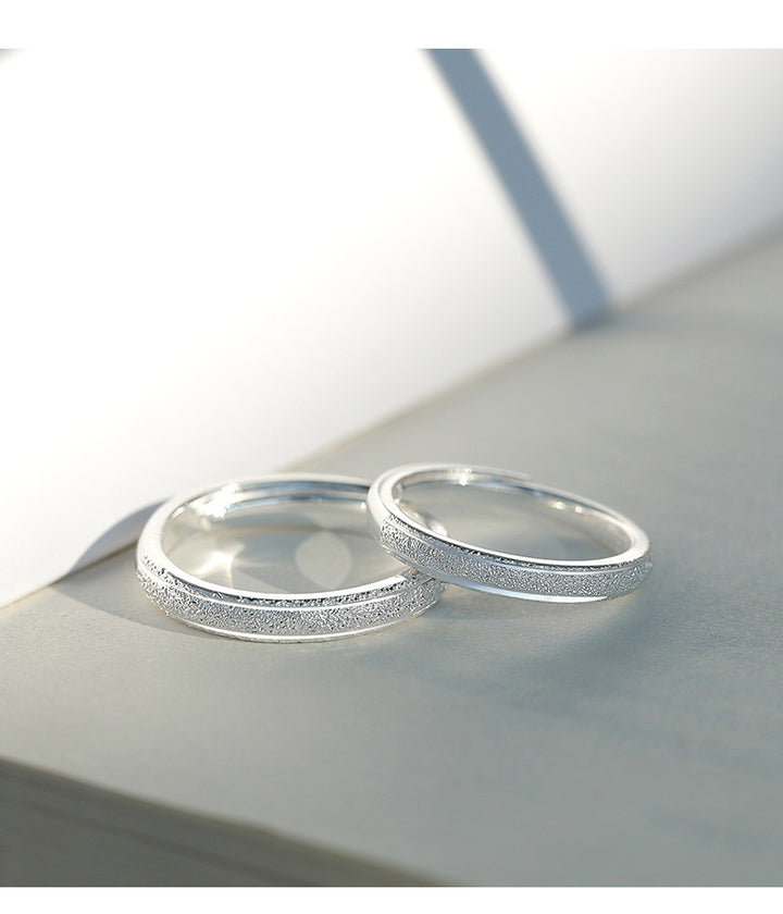 A Pair Of Silver Rings Are Simple