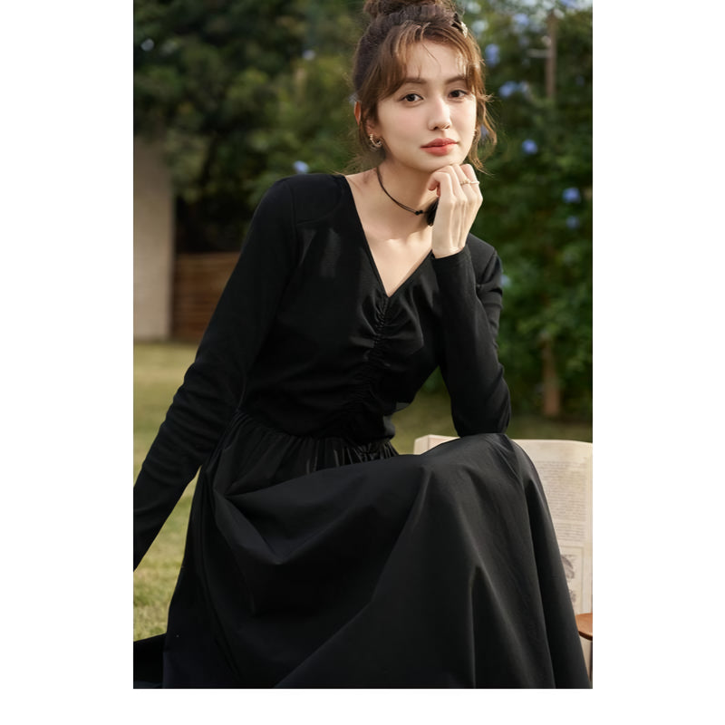 Elegant Black Knitted Smocked V-neck A-line Midi Dress